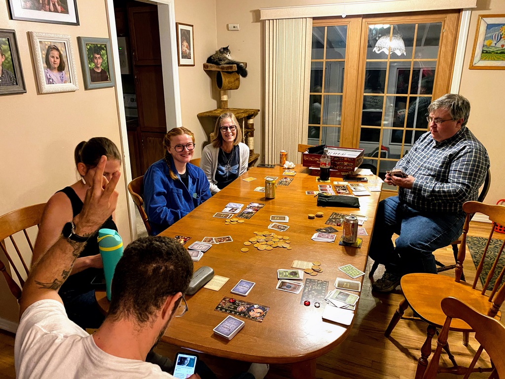 This checkerboard table is made from walnut and pine. Game Night My Little Scythe And The Watson Game Topper Chasing Dings