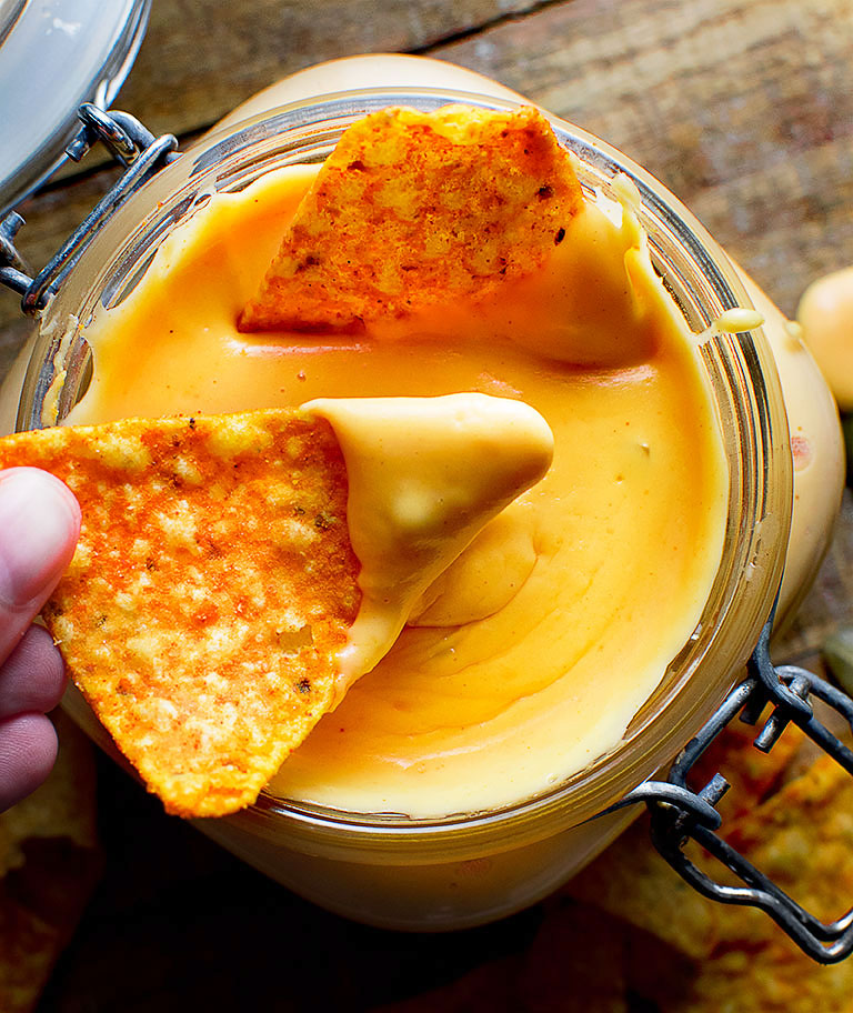 With this easy recipe, you can make your own gooey, creamy, cheesy dip for nachos, fries, and more. NACHO CHEESE SAUCE RECIPE IN 10 MINUTES | Chefjar