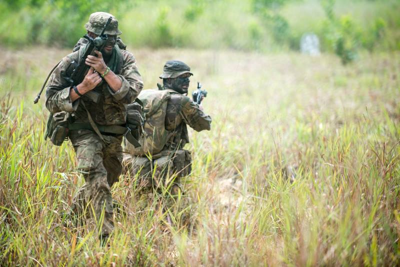 black nike shirt with red swoosh