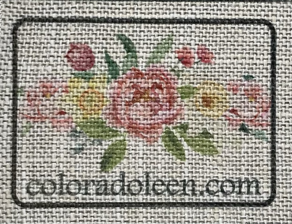Photo showing a sublimated floral image on the textured side of the Kokomo Linen Outdoor fabric used in today's How to Sublimate Hat Patches post.