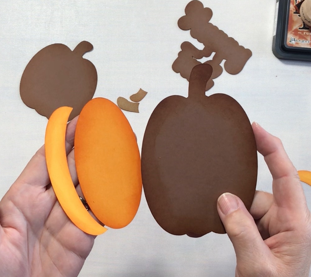 Photo of the pumpkin pieces after they were edged with Rusty Hinge Distress Ink.