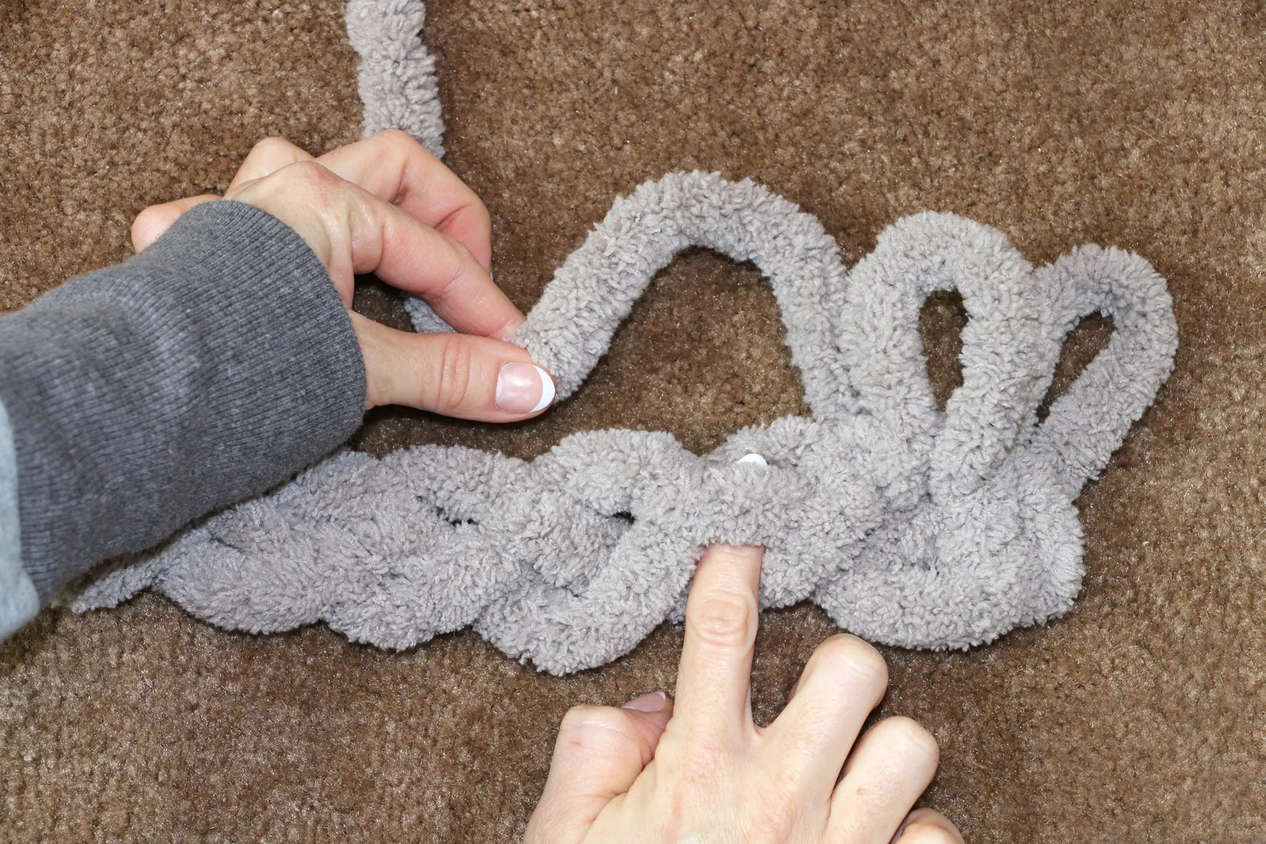 Blanket can be made by using your hand/arm or using large crochet . Easy Chunky Hand Knitted Blanket In One Hour 9 Steps With Pictures Instructables