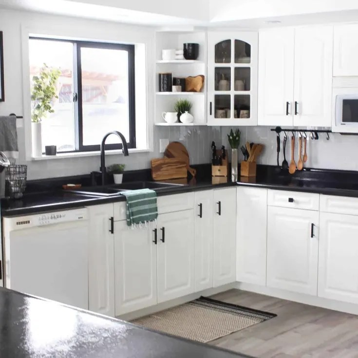 The look of this dark black countertop in this transitional kitchen. 12 Examples Of Black Kitchen Countertops In Beautiful Homes Craftivity Designs