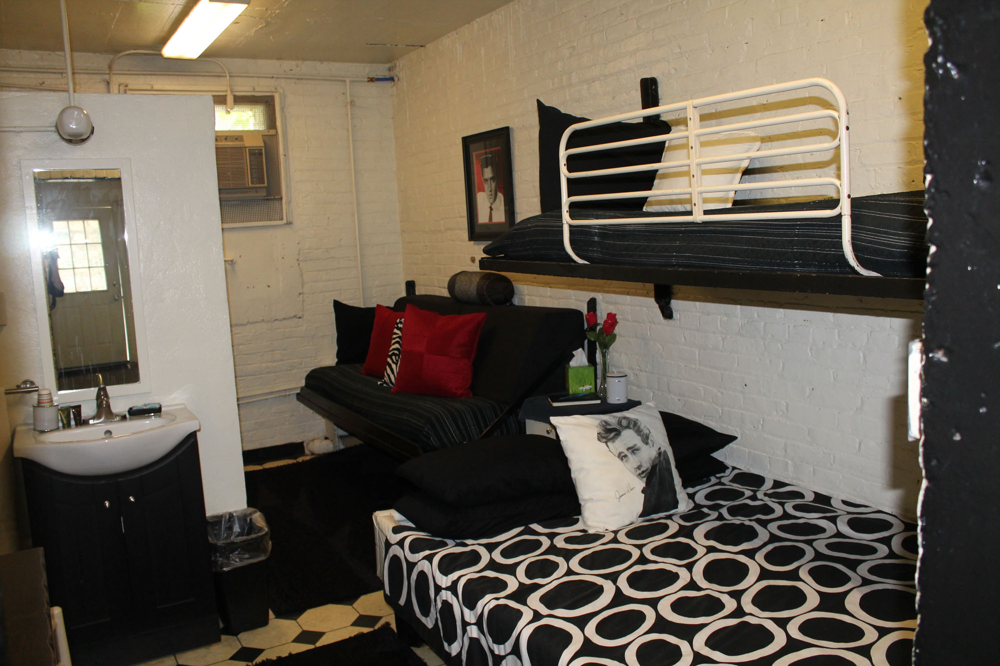 Awakening to the sounds of rustling leaves and distant ocean surf, you stretch out in bed, enjoying your first few moments of the day. Jail Cell - Jailer's Inn Bed & Breakfast