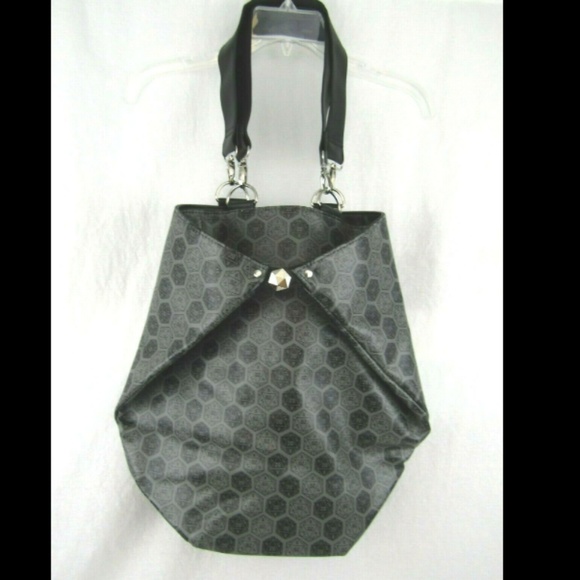 And add cross stitching in the square to hold the handles secure. Thinkgeek Bags Thinkgeek Origami Handbag Of Holding Dd Tote Nwt Poshmark