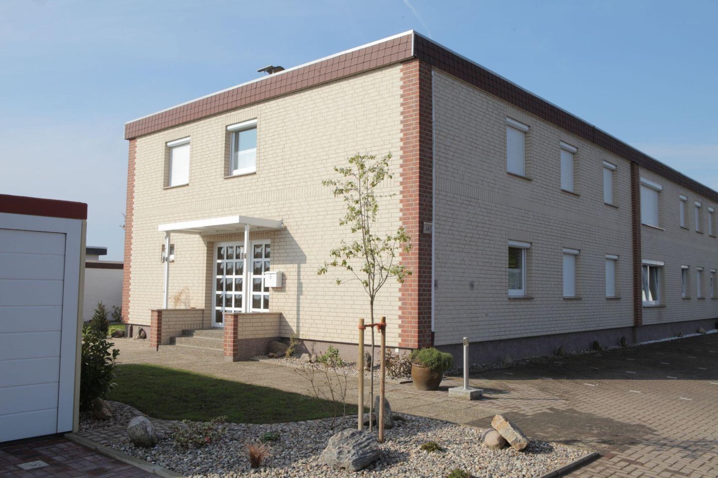Das kampa haus sieht von außen gut aus verklinkert mit holz . GÃ¤stehaus am Kampland - Wohnung 2