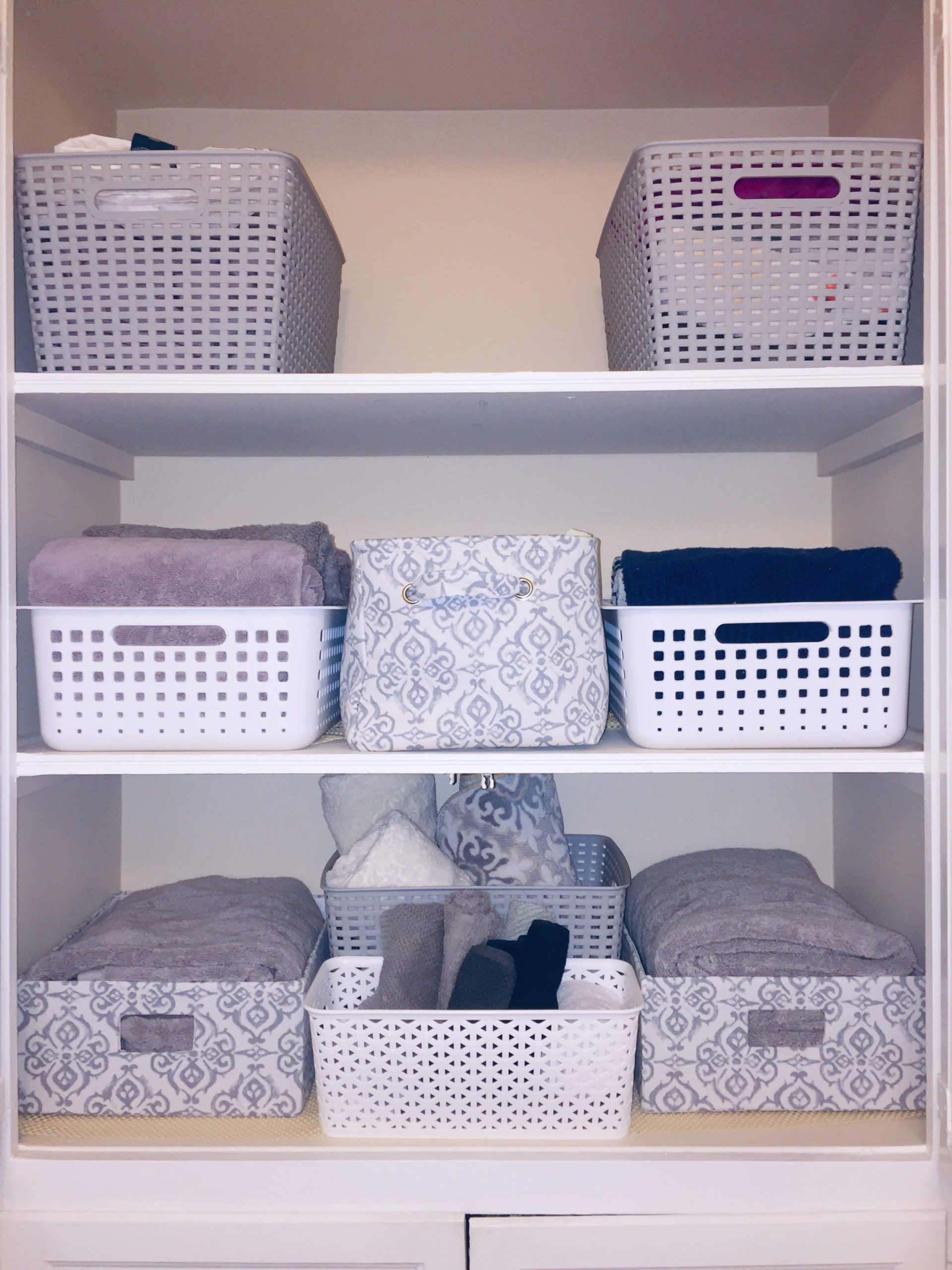 Decluttering your home includes an organized and decluttered linen closet