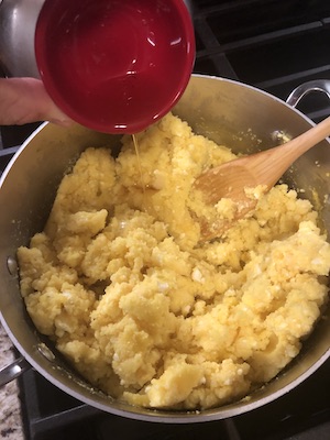 Adding bacon grease to mamaliga mixture