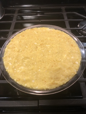 Mamaliga with cheese before baking