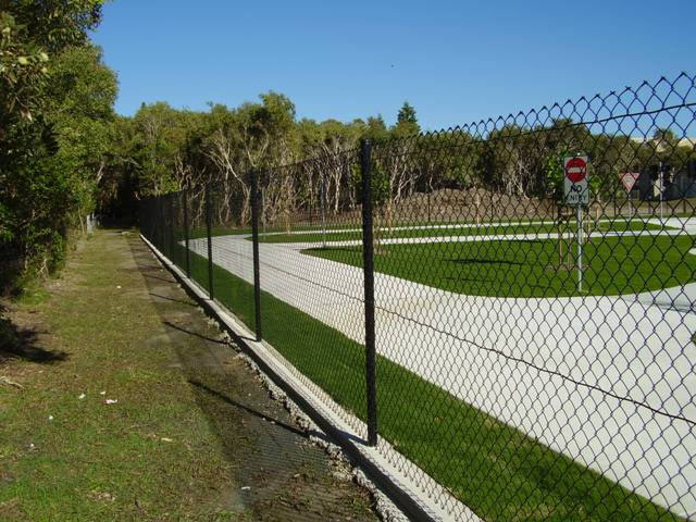 Mow Strip Under Vinyl Fence