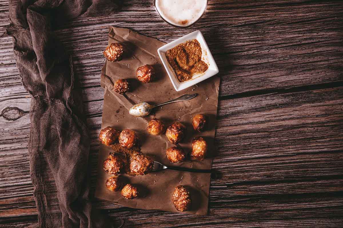 air fryer pretzel bites on wooden table