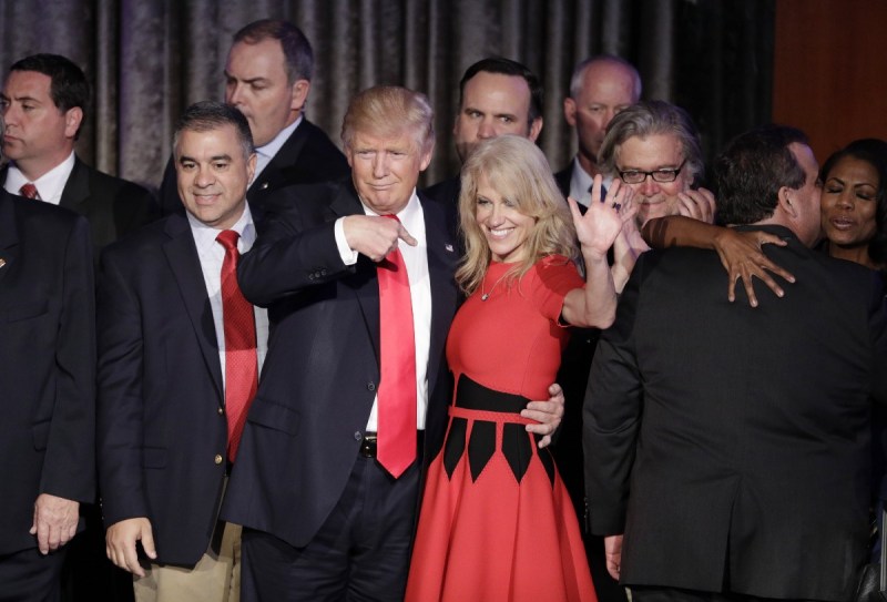 Donald Trump and campaign manager Kellyanne Conway celebrate during an election night rally. CREDIT: AP Photo/John Locher.