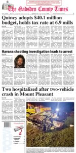 Front page of the October 8, 2026 edition of The Gadsden County Times reporting on Quincy adopting a $40.1 million budget while keeping its tax rate at 6.9 mills, an arrest made in a Havana shooting investigation featuring Orlando Kelly's mugshot, and a night scene photo of a two-vehicle crash in Mount Pleasant that resulted in two hospitalizations.