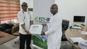 fashion designer, Seyi Vodi, and the Acting Executive Chairman of the FCT-IRS, Mr Michael Ango