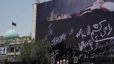 U.S. President Donald Trump lying in an open black coffin