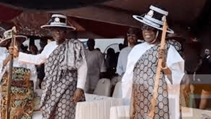 Bola Tinubu with Eyo cap