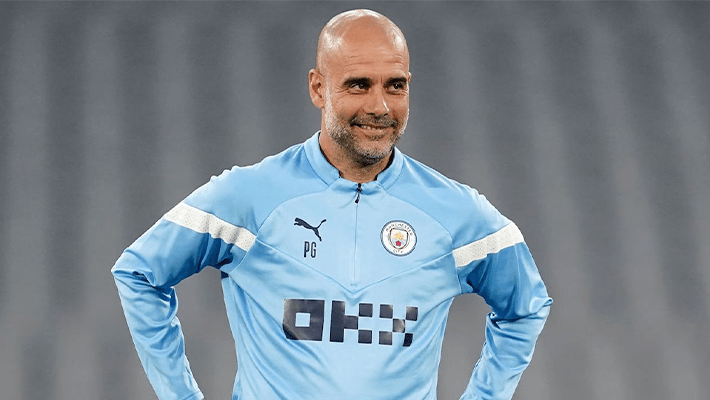 Pep in Man City shirt