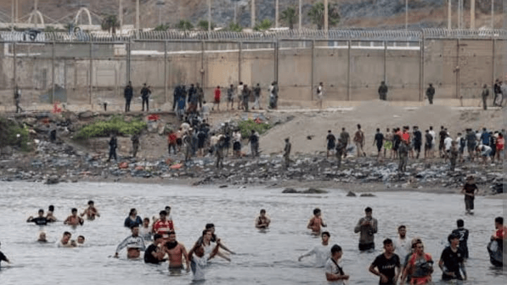 Migrants crossing into Spanish territory