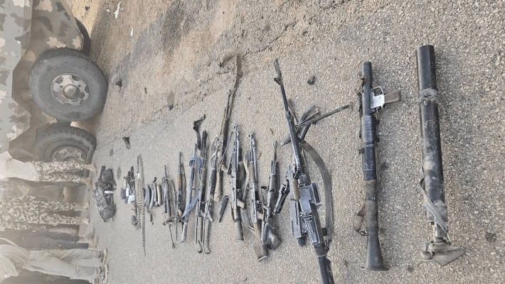 recovery of a large cache of arms and ammunition,
