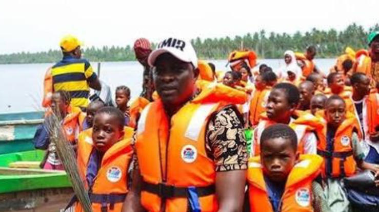 Commuters with life jackets on a boat