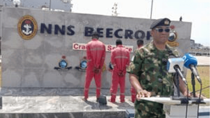 Commodore Aiwuyor Adams-Aliu and the arrested Ghanaian stowaways