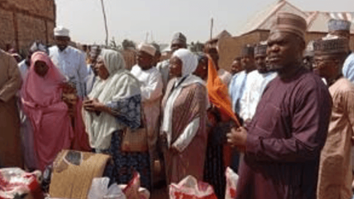 NBA members presenting donated items to IDPs in Sokoto on Friday