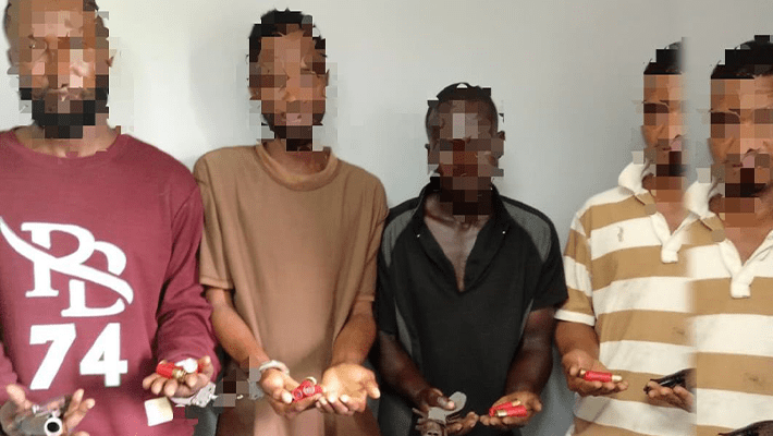 four suspected cultists