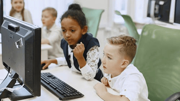 Kids in front of computer