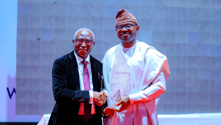 Olubunmi Tunji-Ojo receiving his award