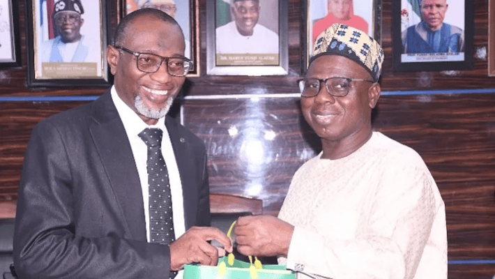 COREN’s team lead, Abdulkarim Nasir with YABATECH rector, Ibraheem Abdul