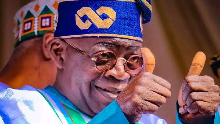 Tinubu with thumbs up