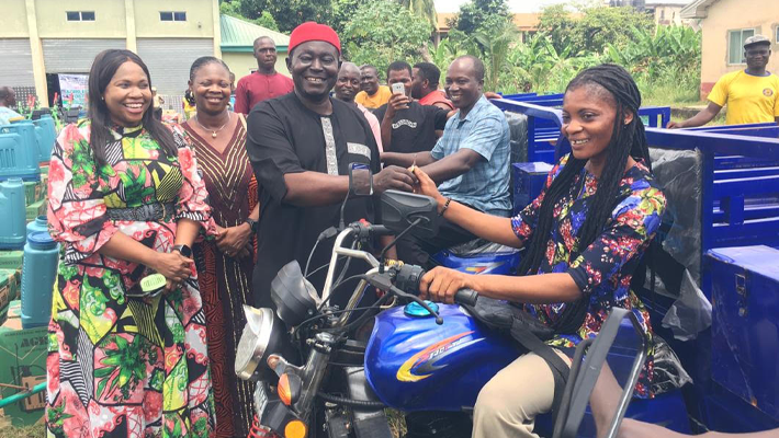 IFAD distribute tricycles, farm equipment