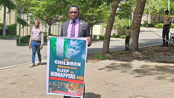 Man takes protest to UN Abuja office