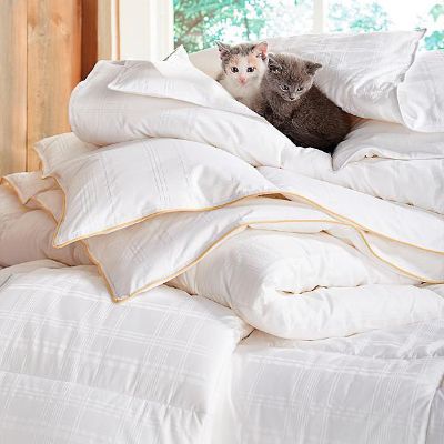 The asymmetric duvet cover, queen size, is our top selling product. how to layer your bed our best