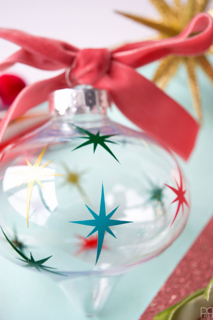 Make your tree shine with these DIY Christmas Ornaments made using the Cricut! So many easy ornament ideas to help you deck your halls—using your Cricut or other electronic cutting machine!