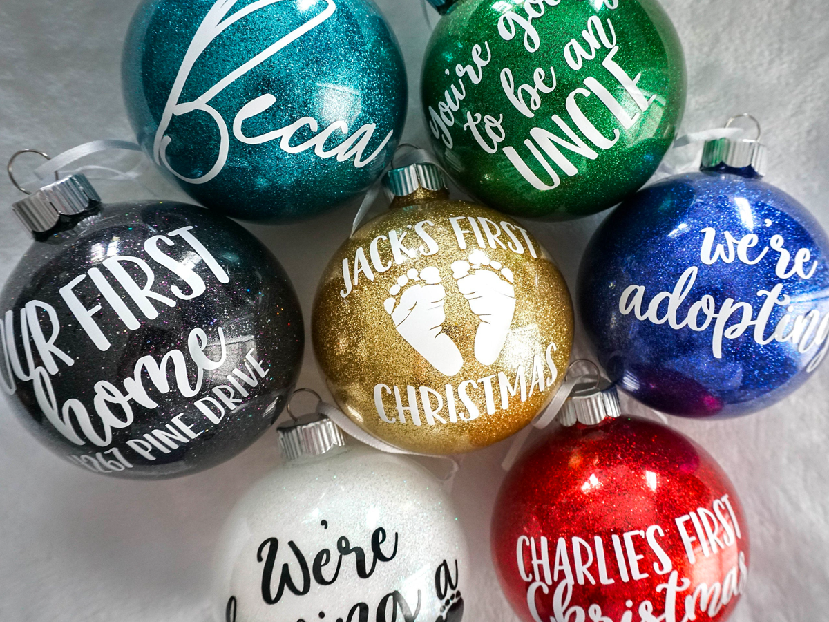 If you're going for a classy winter wonderland aesthetic, an etched glass ornament will look great sparkling at the top of the tree. 10 Of The Best Personalized Christmas Ornaments