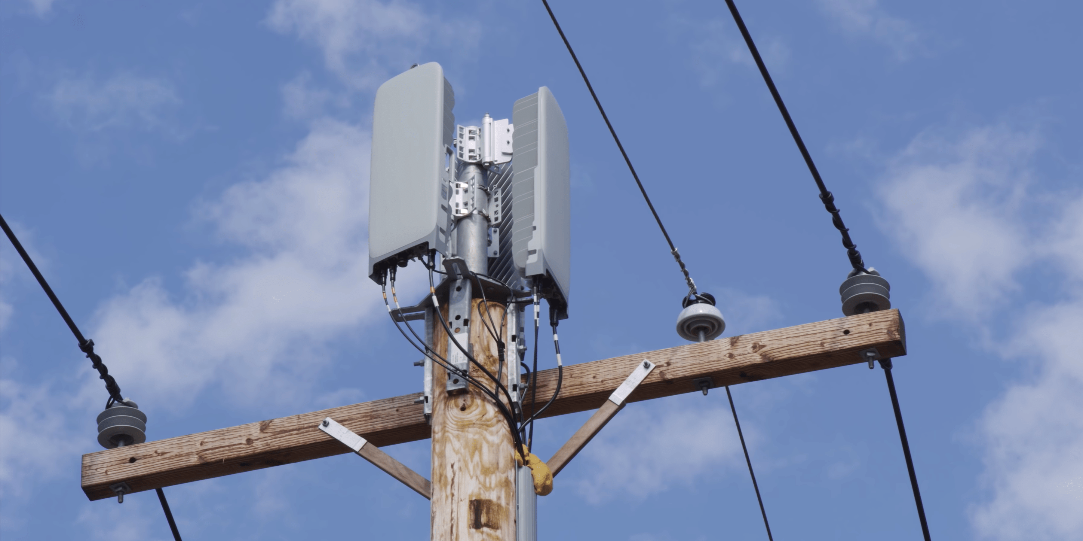 5g telecommunication tower under blue sky 3d illustration stock photo. 5g Coronavirus Conspiracy Theory And Arson Attacks On Cellphone Towers Pushed By Russian Bots