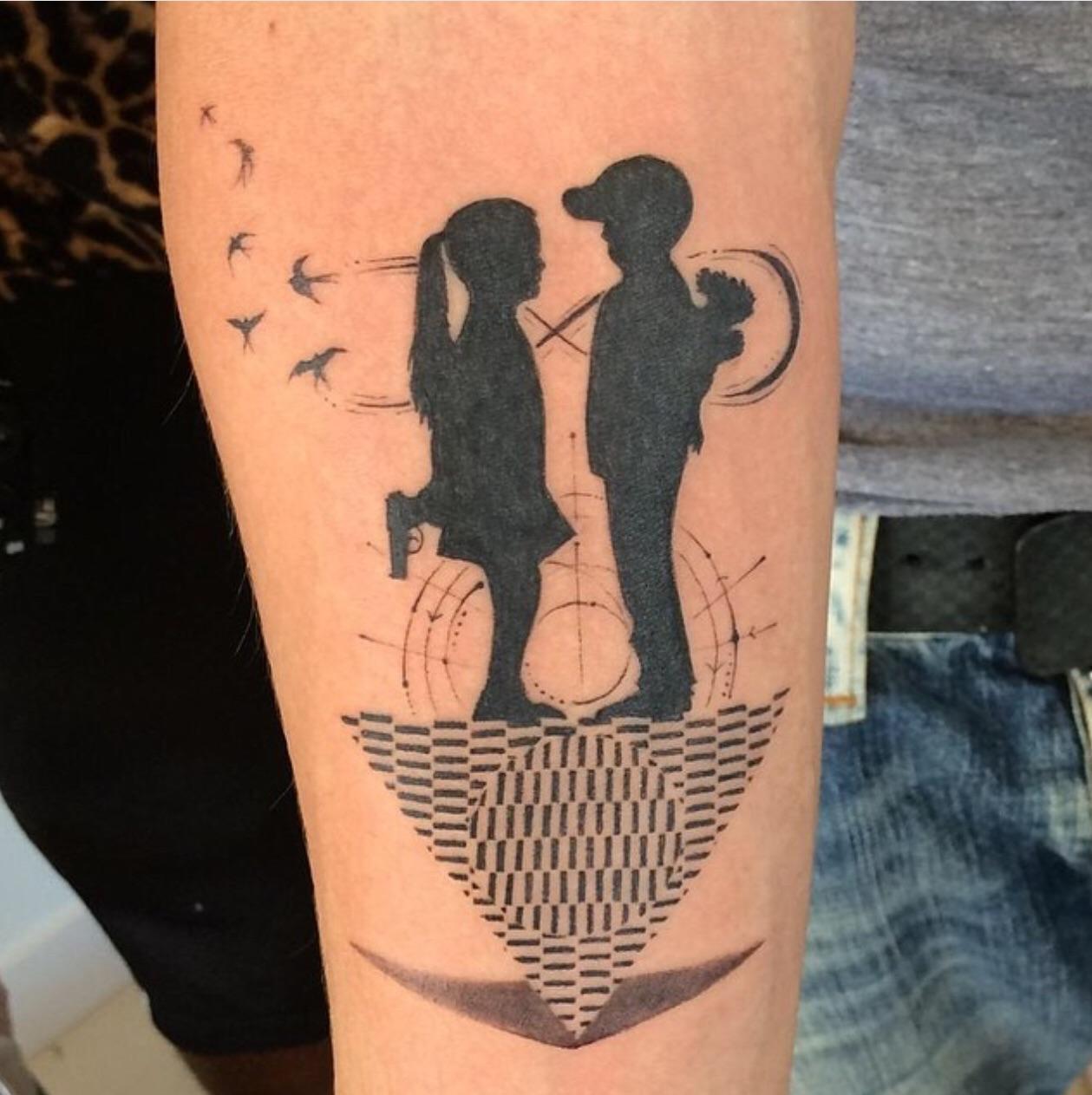 Meaning Of This Tattoo. What Would It Mean, And Why Is The Girl Having A Gun? Does The Birds Flying Away Mean Something Or What Are They Standing On? Has He Ever 1263_x_1259_jpg