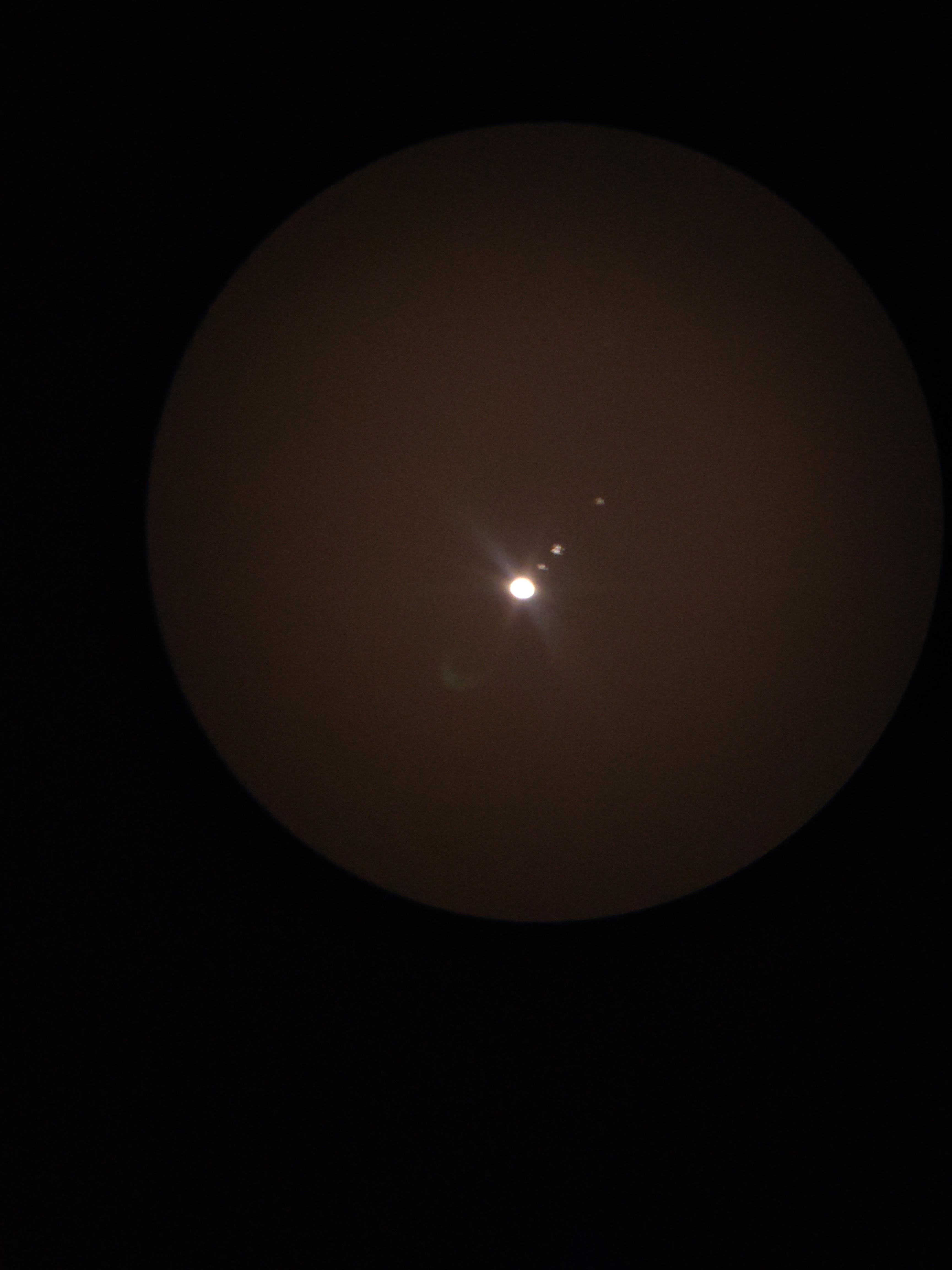 Jupiter And Its Moons Through My Telescope Celestron Astromaster 130eq Photo Taken On Phone Cam Telescopes