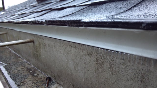 When your rain gutters overflow, this can also be due to the gutter size. roofing - How can I prevent water from getting behind the