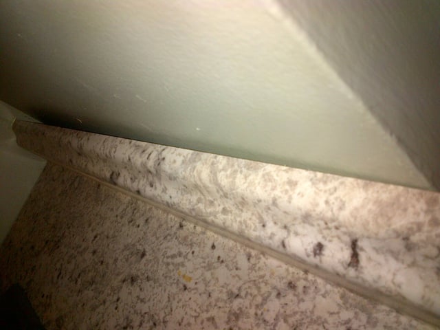 Buying kitchen cabinets seems like an easy task. kitchen counters - How can I deal with non square walls