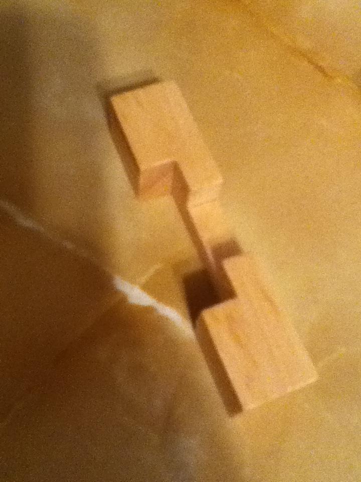 How To Solve This 3d Wooden Puzzle Which Becomes An Interlocking Cross Puzzling Stack Exchange
