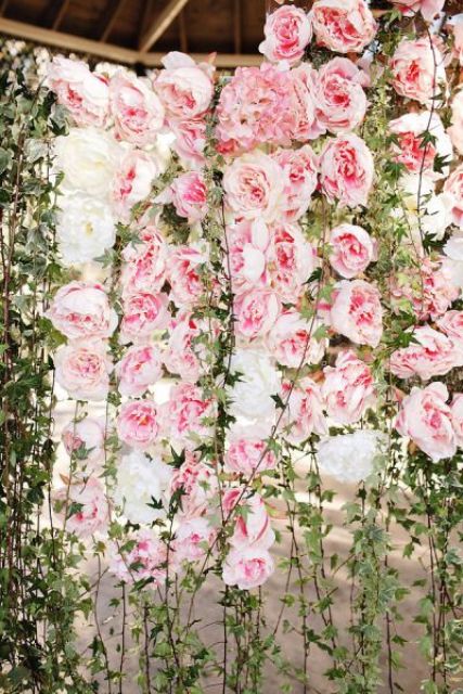 Pretty flower petals streak down this gorgeous shower curtain as if they are on vines. The Hottest 2015 Wedding Trend: 22 Flower Wall Backdrops