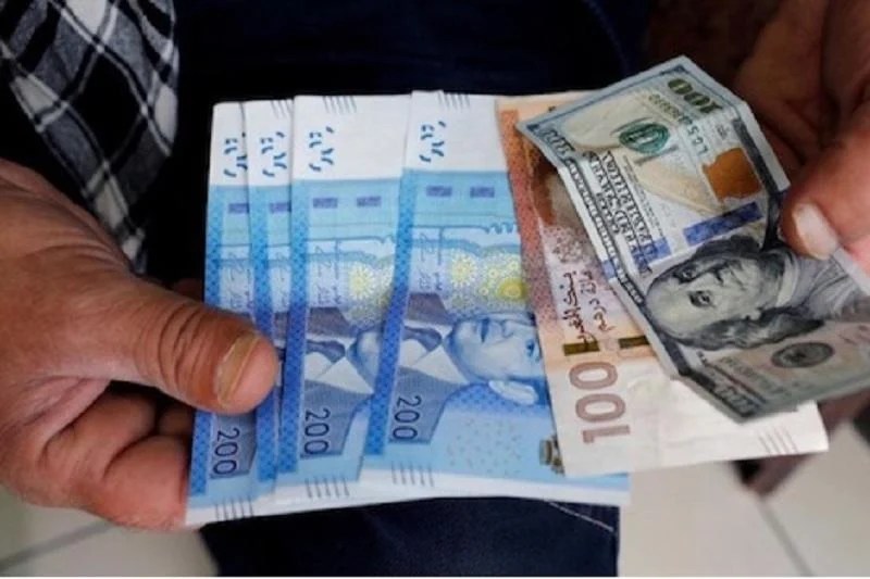 سعر الدرهم يتسحن مقابل الدولار