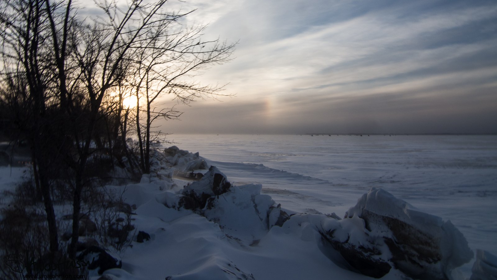 January 3rd : Cold whip up over Ottertail Lake in Minnesota. A sundog - the essence of cold weather- hangs in the sky