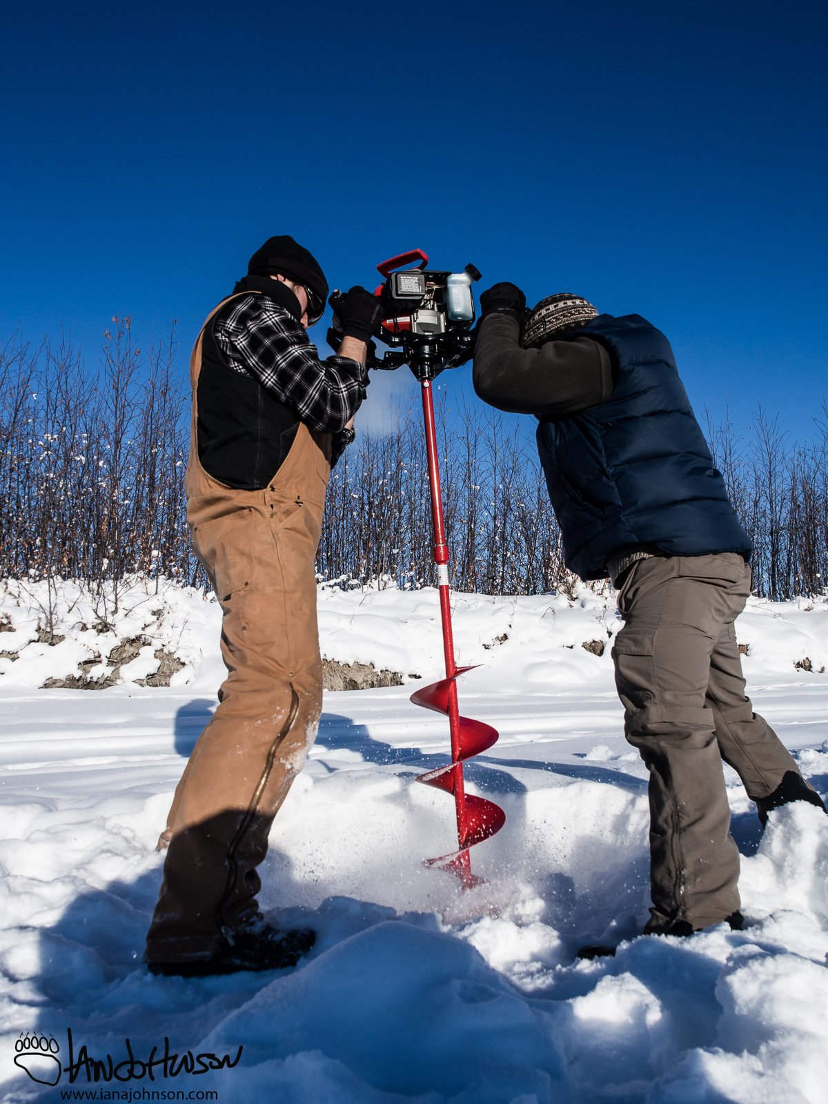 February 14th : Drilling holes in the Tanana River for burbot - needed some reach! Lots of ice.
