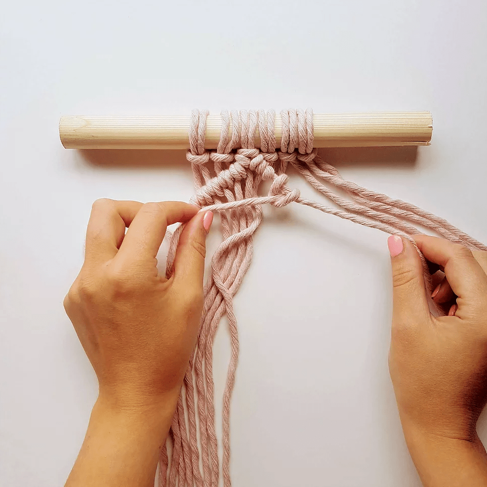 You'll need three lengths of cord for this knot. How to tie a double half hitch knot / Learn how to make