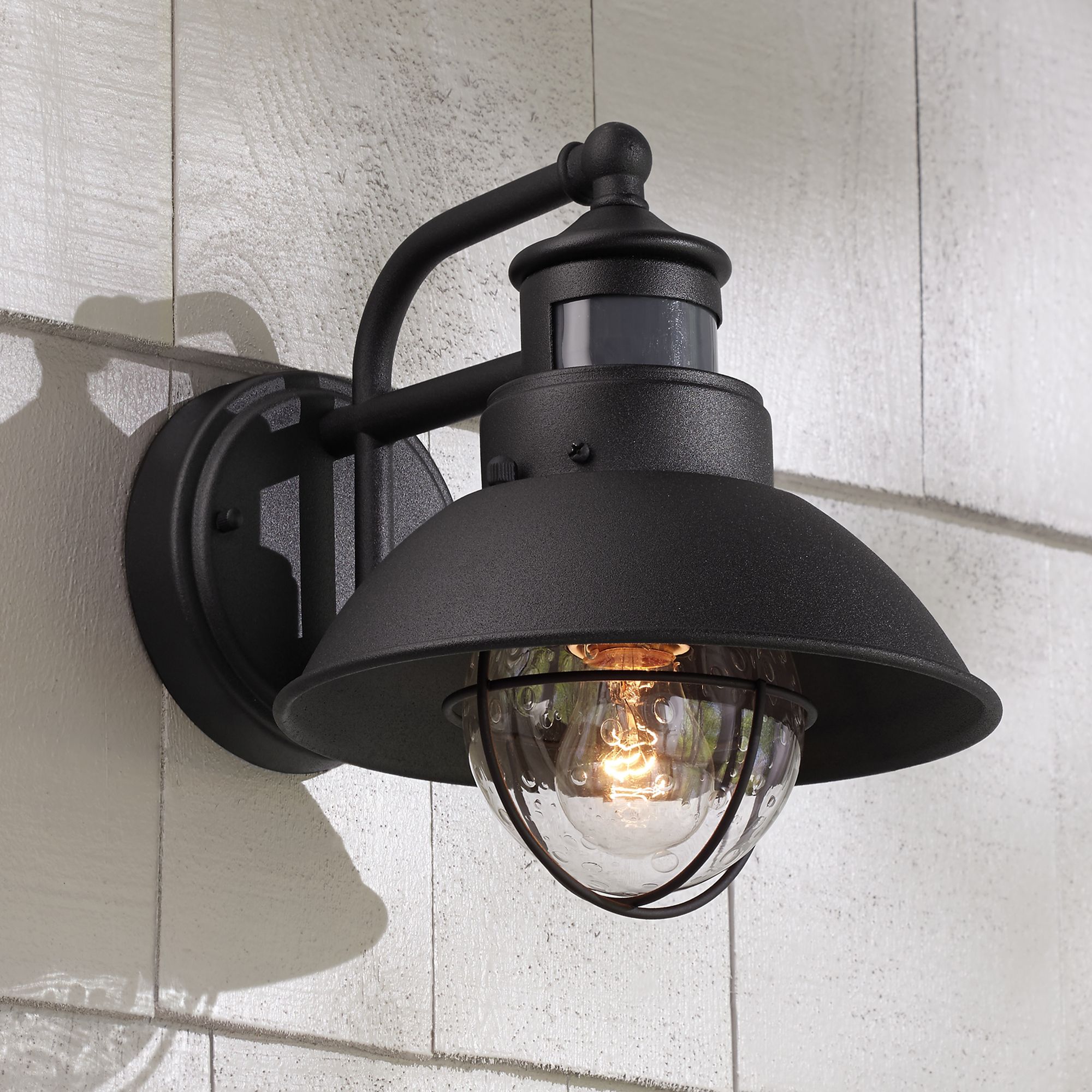The exterior of your home is the first thing you see, so making sure it's well maintained is important. Fallbrook 9"H Black Dusk to Dawn Motion Sensor Outdoor Light - #5Y111 | Lamps Plus