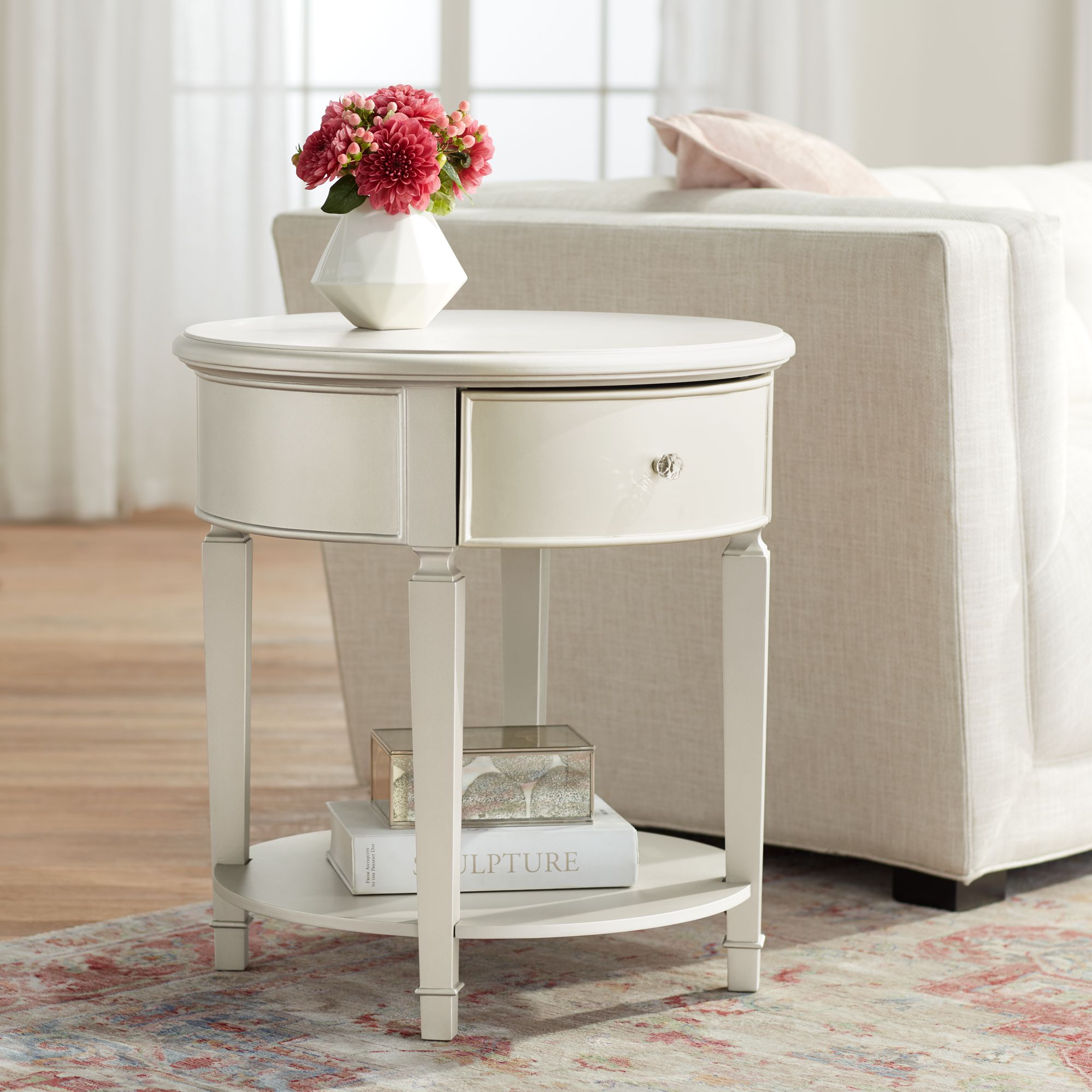 Enjoy free shipping & browse our great selection of bedroom furniture, headboards, bedding and more! alina 1 drawer champagne silver round side table