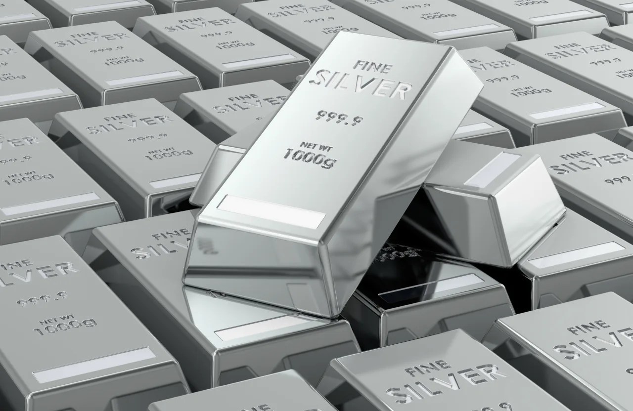 Silver falls as much as 13% as the volatility continues in metals